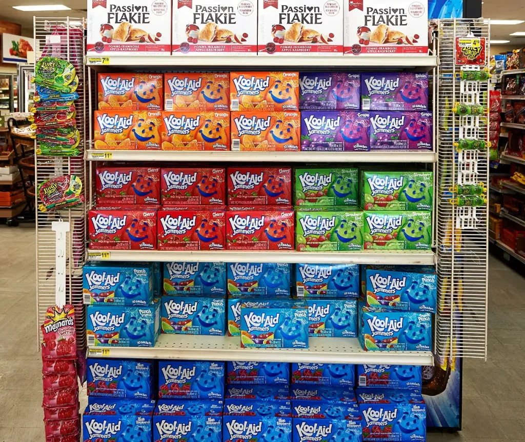 End display filled with Kool-Aid and Passion Flakie desserts